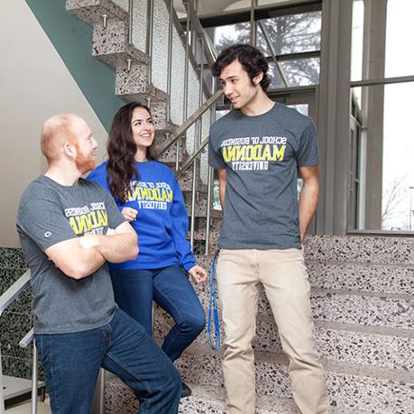 Students on staircase conversing